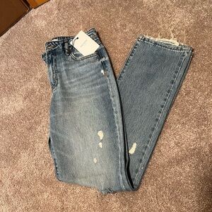 Distressed Blue Jeans